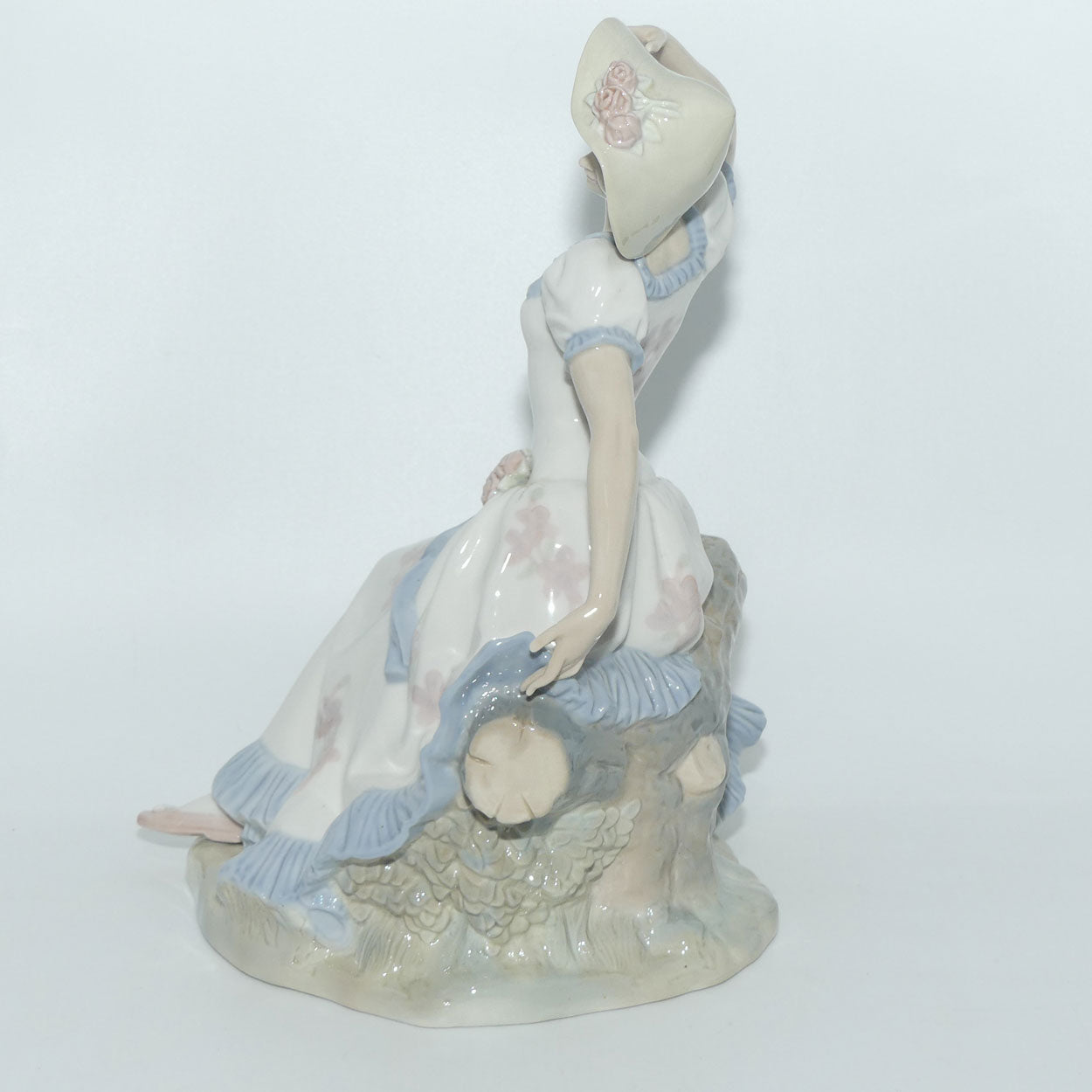 Zaphir | Nao | Lladro figure of a Seated Lady in Sun Hat