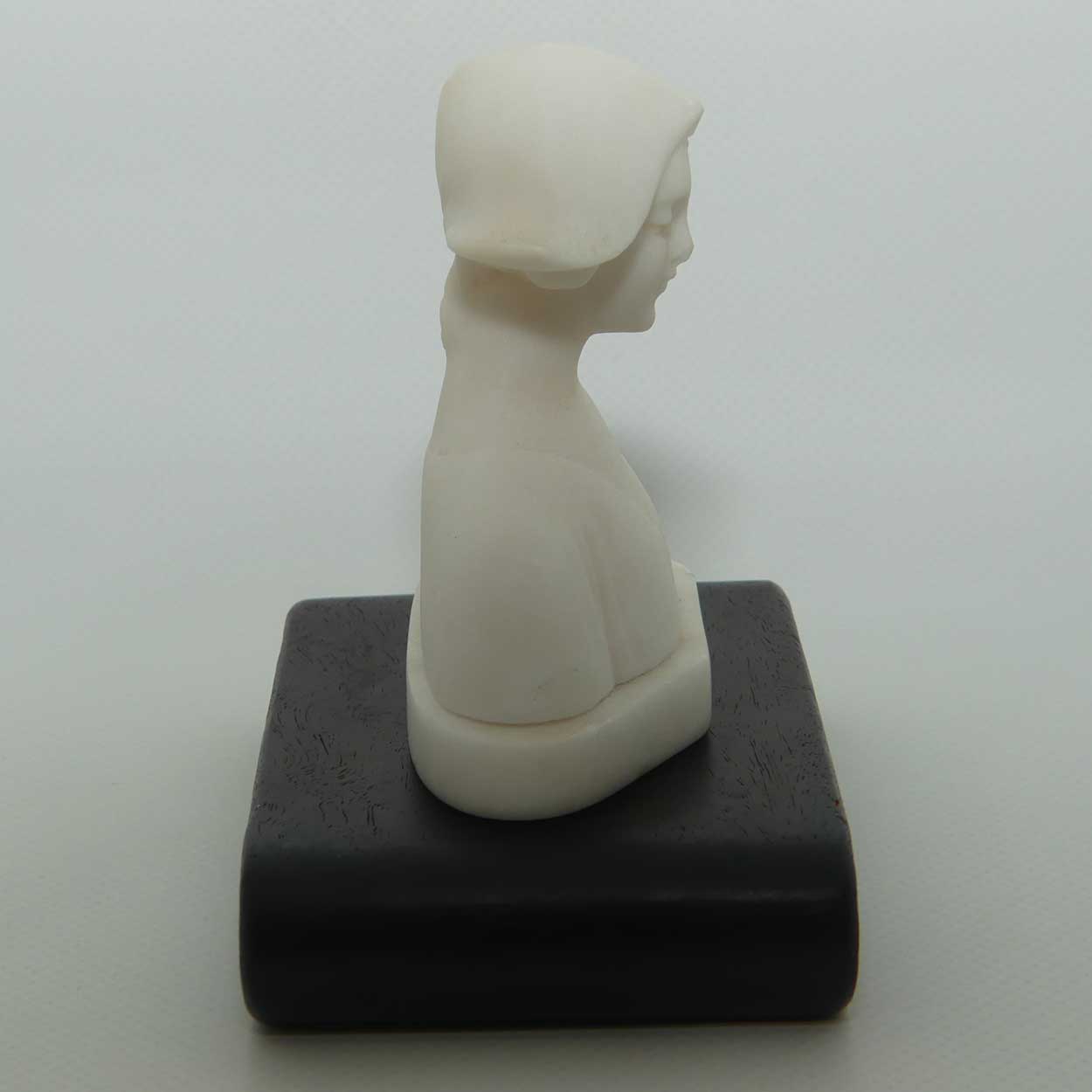 Small Alabaster Bust of Dutch Girl on timber base by Raffaello Romanelli