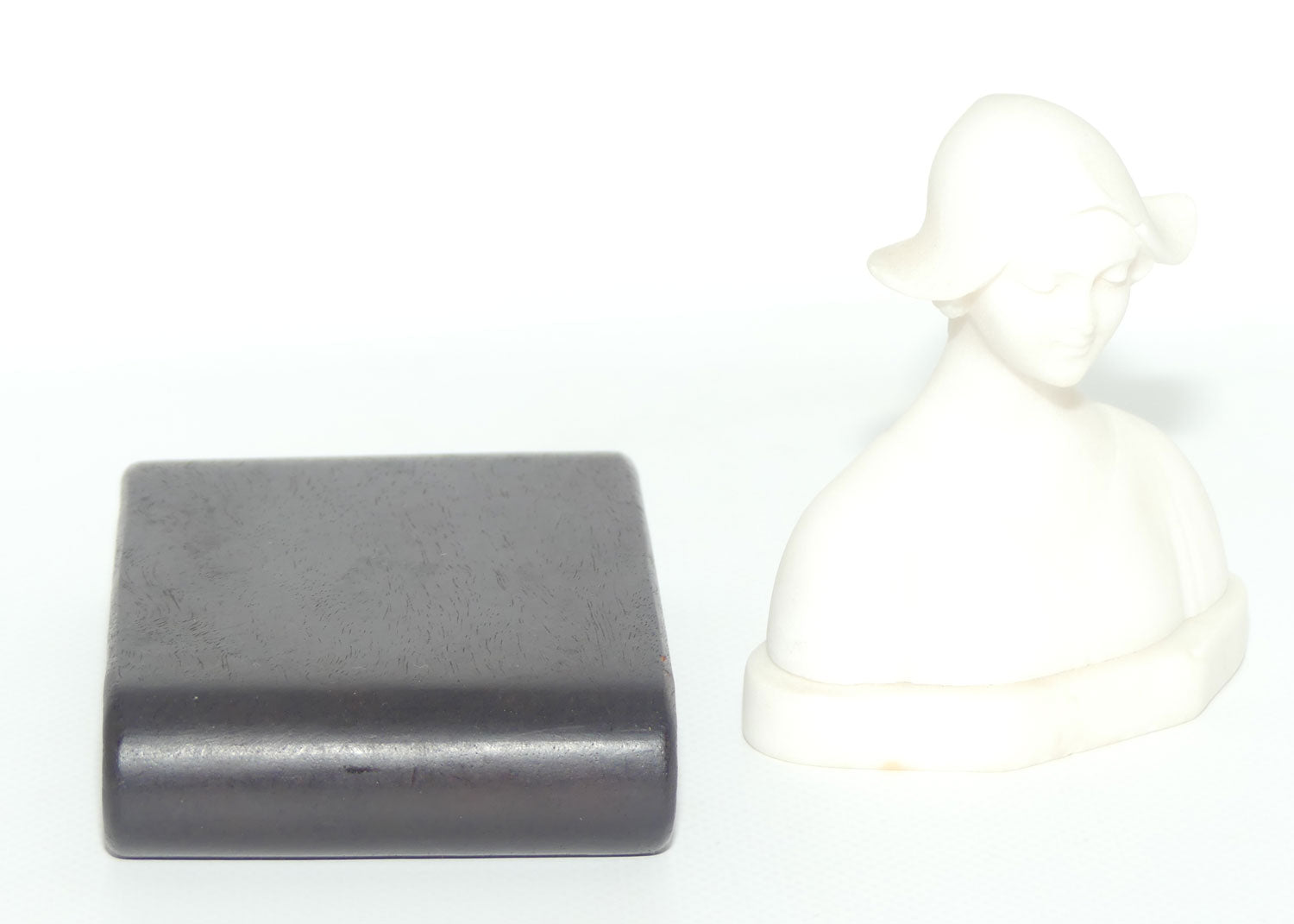 Small Alabaster Bust of Dutch Girl on timber base by Raffaello Romanelli