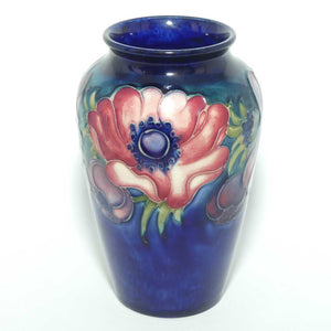 Walter Moorcroft Anemone on Blue ground small reverse tapering vase