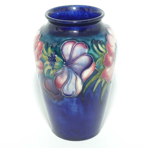 Walter Moorcroft Anemone on Blue ground small reverse tapering vase