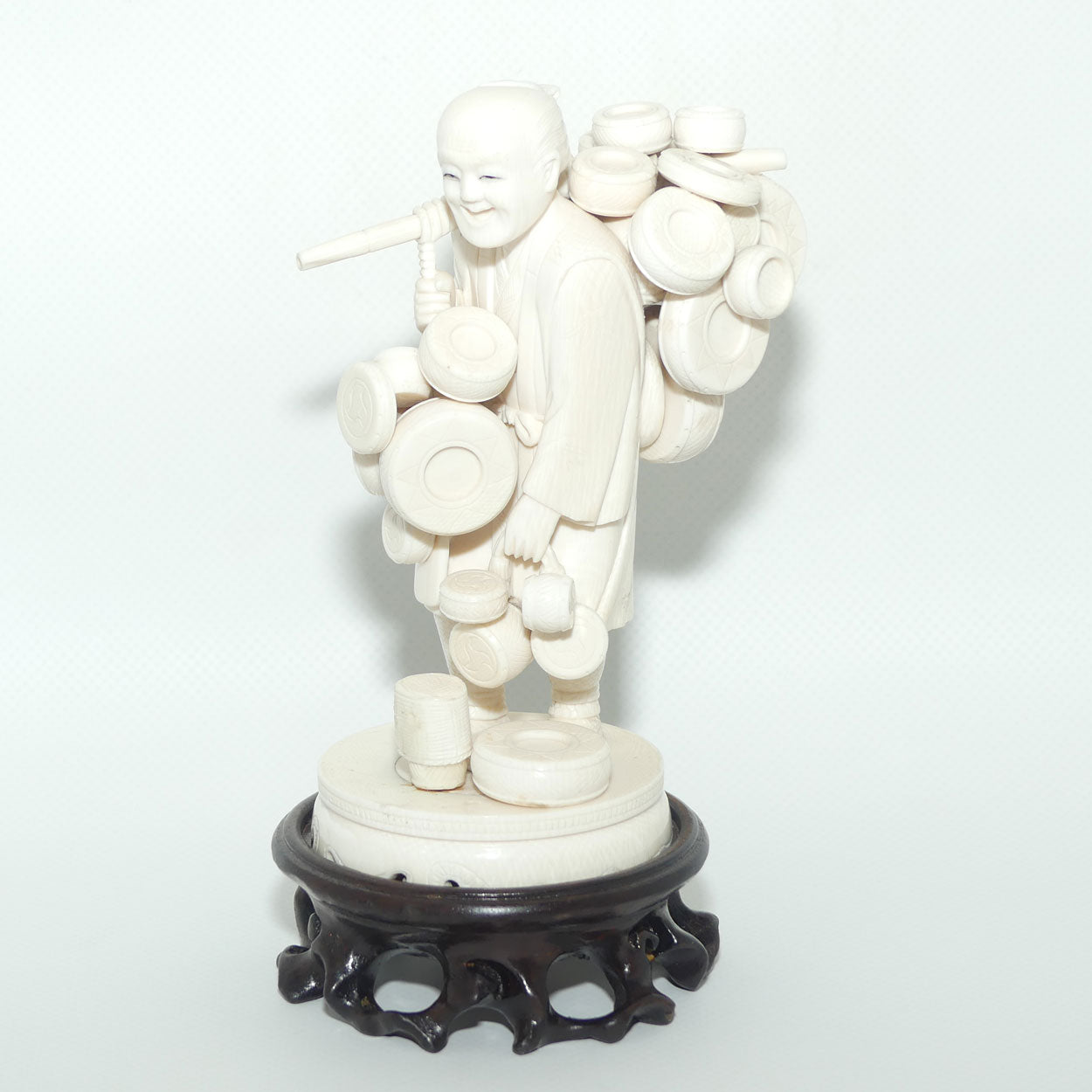 Japanese Carved Ivory Okimono figure on wooden base | Basket Vendor | Meiji period | signed