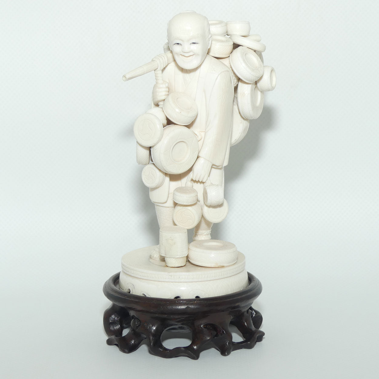 Japanese Carved Ivory Okimono figure on wooden base | Basket Vendor | Meiji period | signed