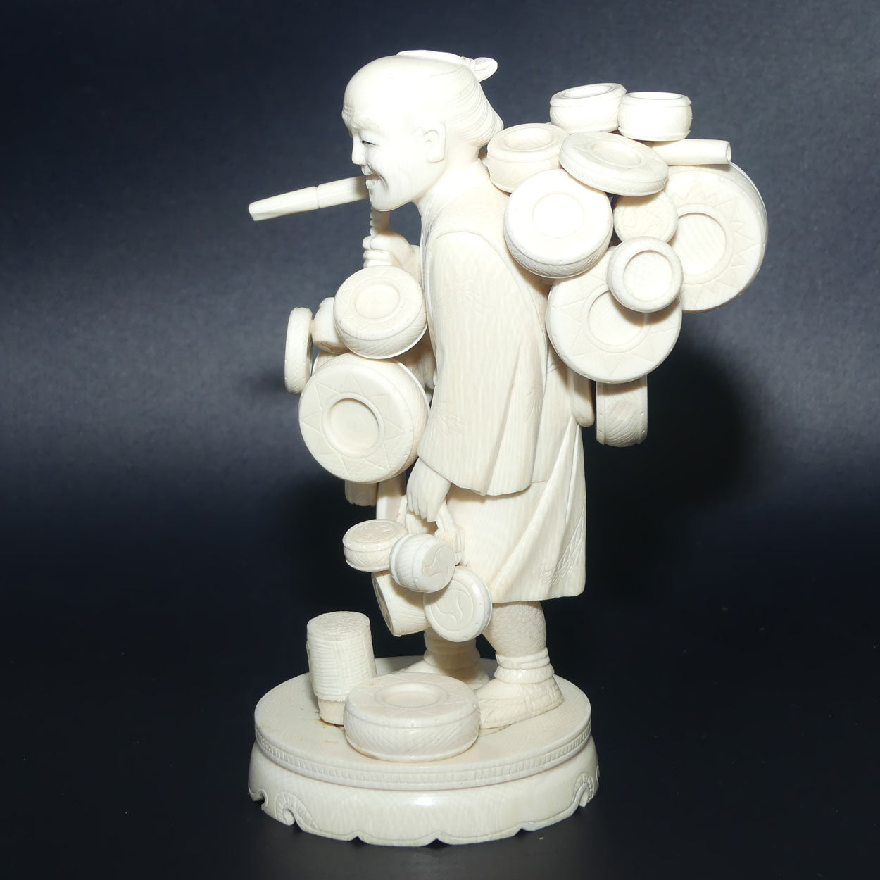 Japanese Carved Ivory Okimono figure on wooden base | Basket Vendor | Meiji period | signed