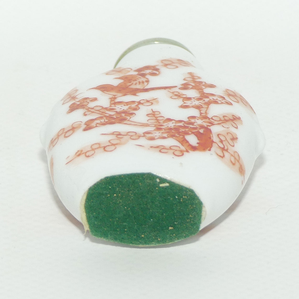 Chinese snuff bottle with greenstone stopper | Iron Red Birds in Cherry Blossom Tree