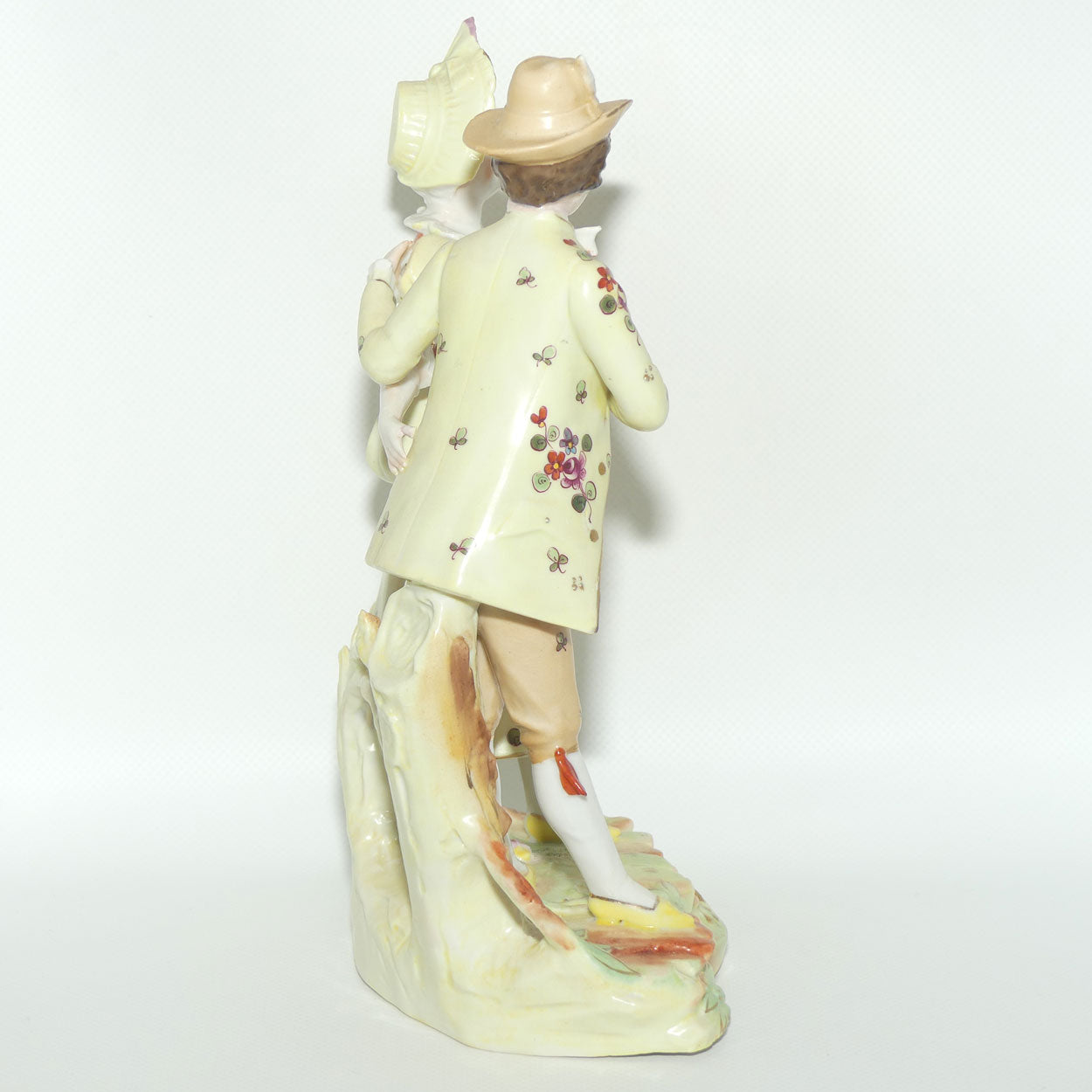 Victorian era Lady and Gent bisque figurine group