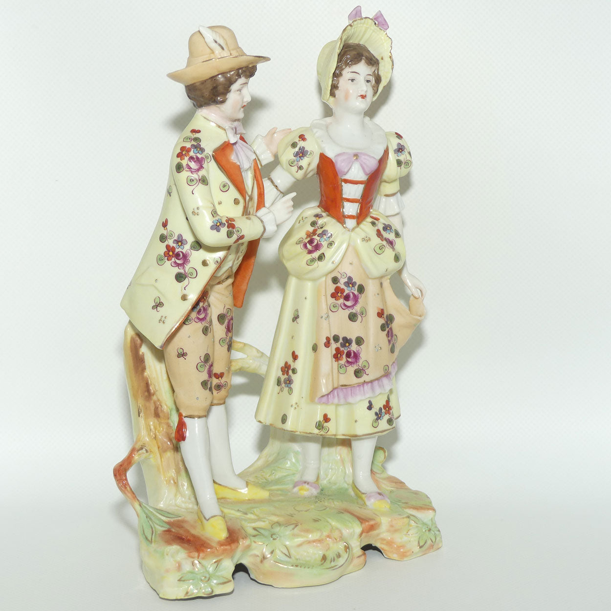 Victorian era Lady and Gent bisque figurine group