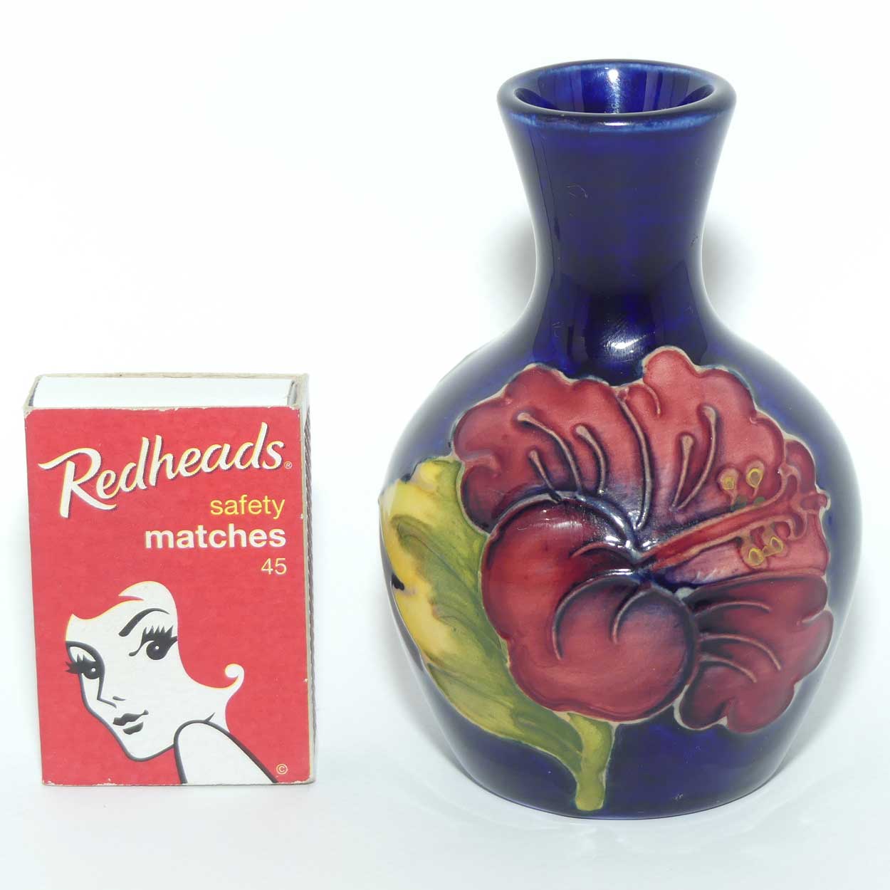 Walter Moorcroft Hibiscus on Blue Ground miniature bud vase