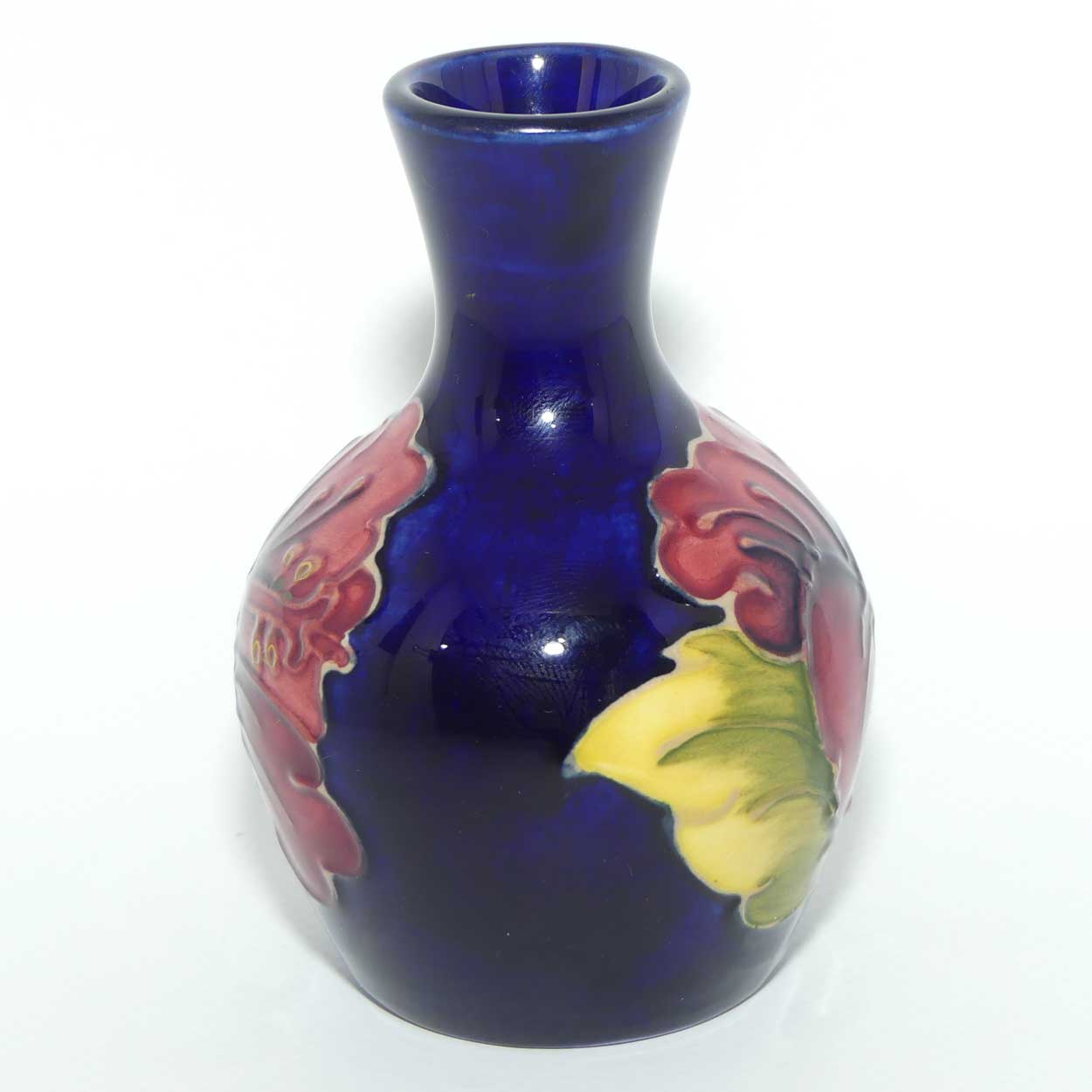Walter Moorcroft Hibiscus on Blue Ground miniature bud vase
