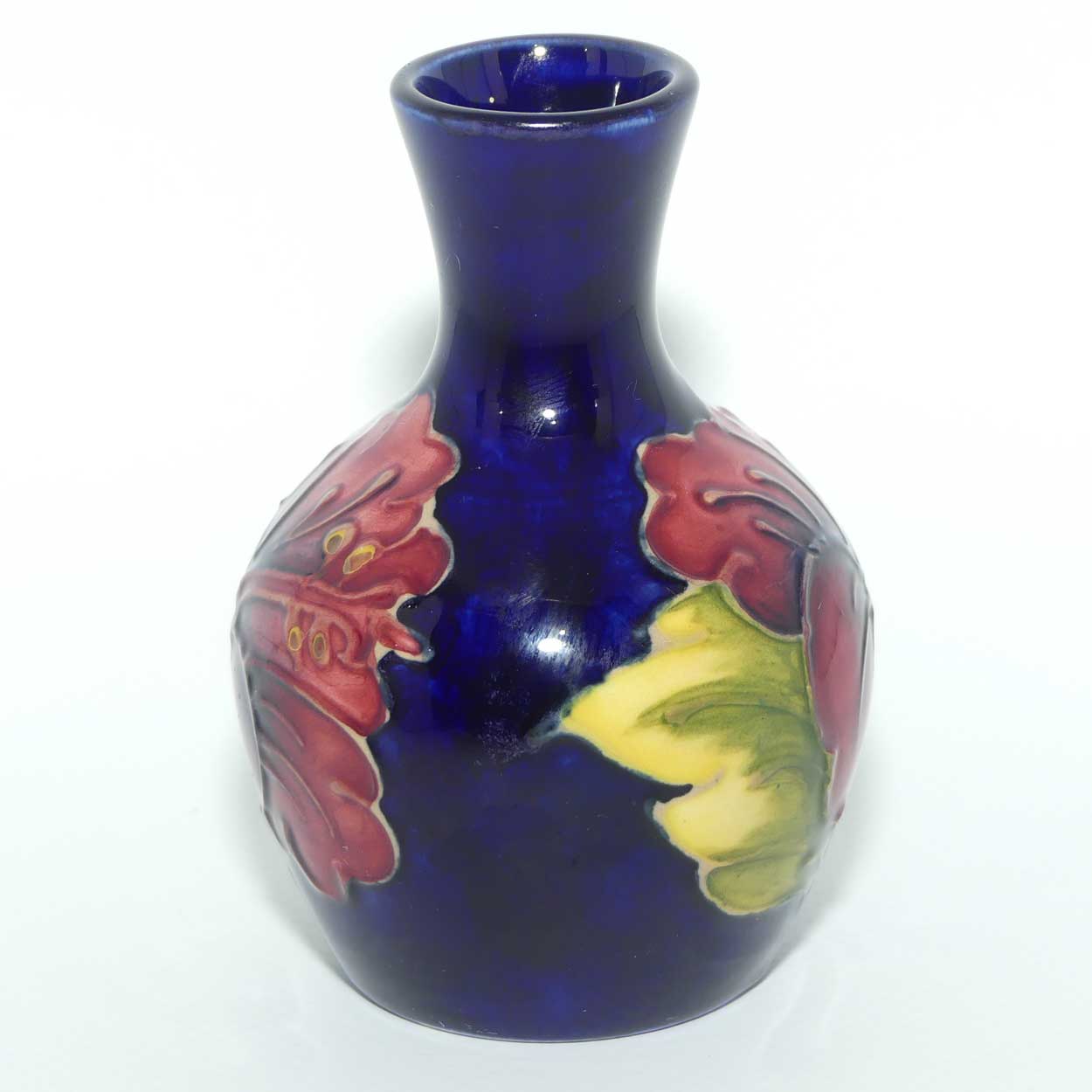 Walter Moorcroft Hibiscus on Blue Ground miniature bud vase