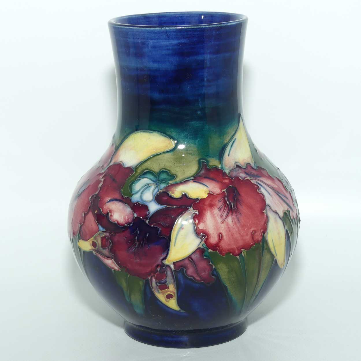 Walter Moorcroft Orchid on Dark Blue Ground bulbous vase