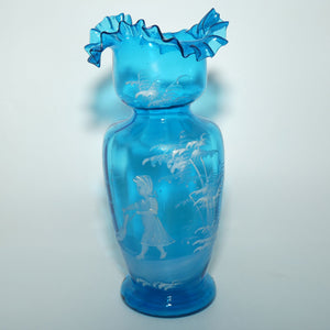 Ice Blue glass Frilled Top Mary Gregory vase depicting a Girl with rag doll 