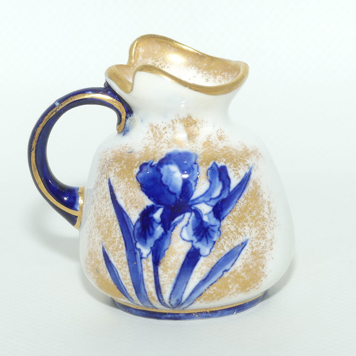 Royal Doulton Blue and White miniature jug | Fancy rim | Orchid