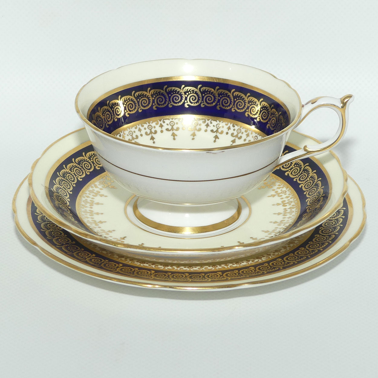 Paragon Bone China Royal Blue and Gilt trio