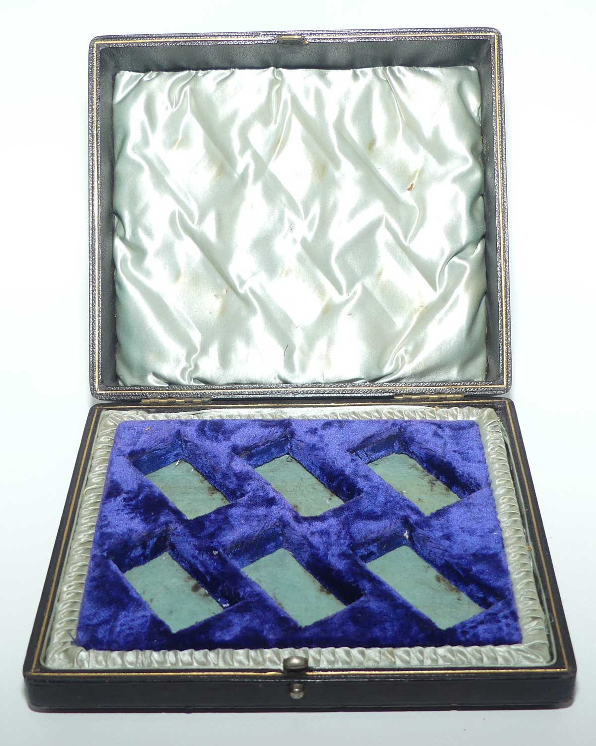 Edwardian era set of 6 Embossed triangular Silver plated napkin rings