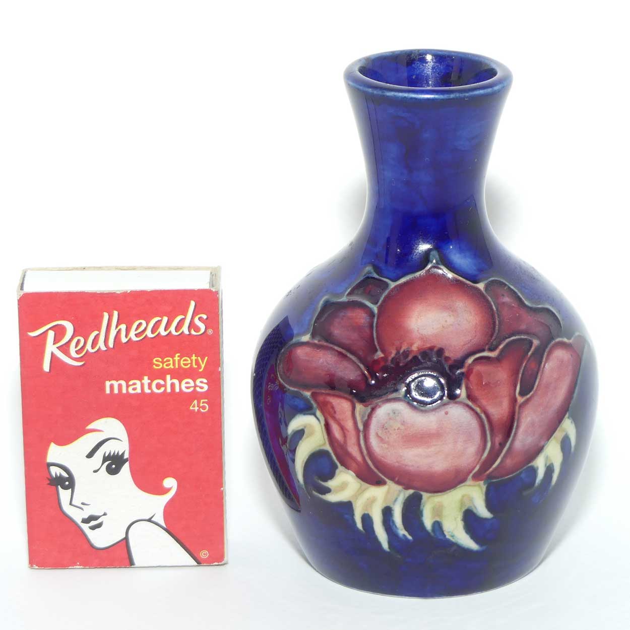 Walter Moorcroft Anemone on Blue ground bud vase