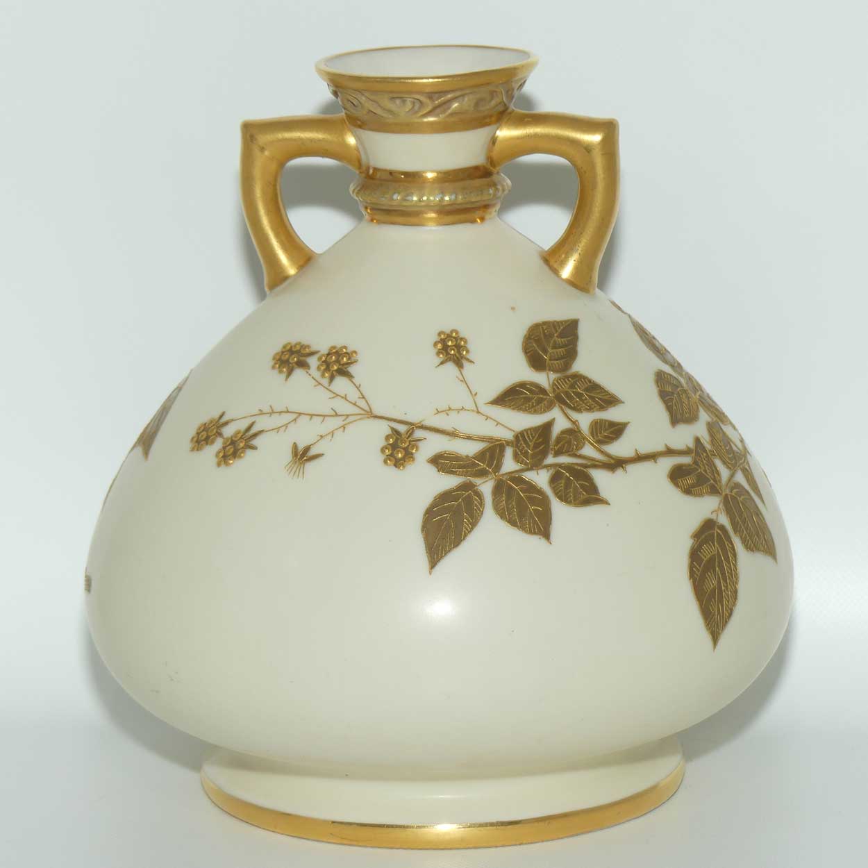 Royal Worcester Blush Ivory hand painted bulbous gilt vase