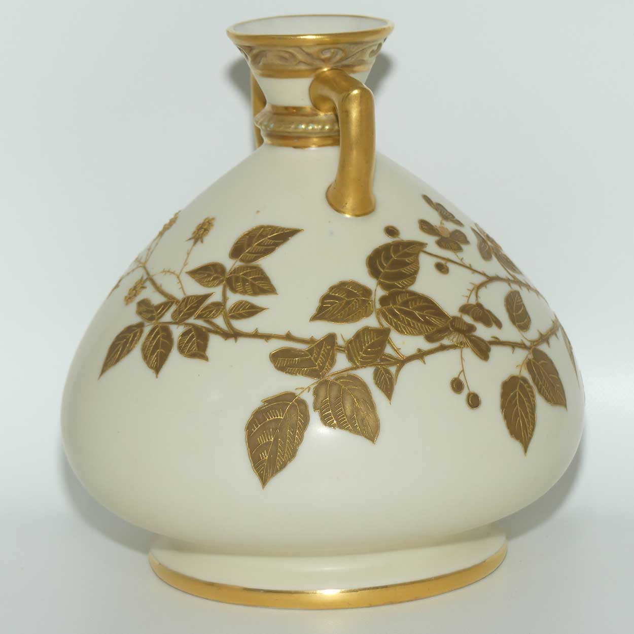 Royal Worcester Blush Ivory hand painted bulbous gilt vase