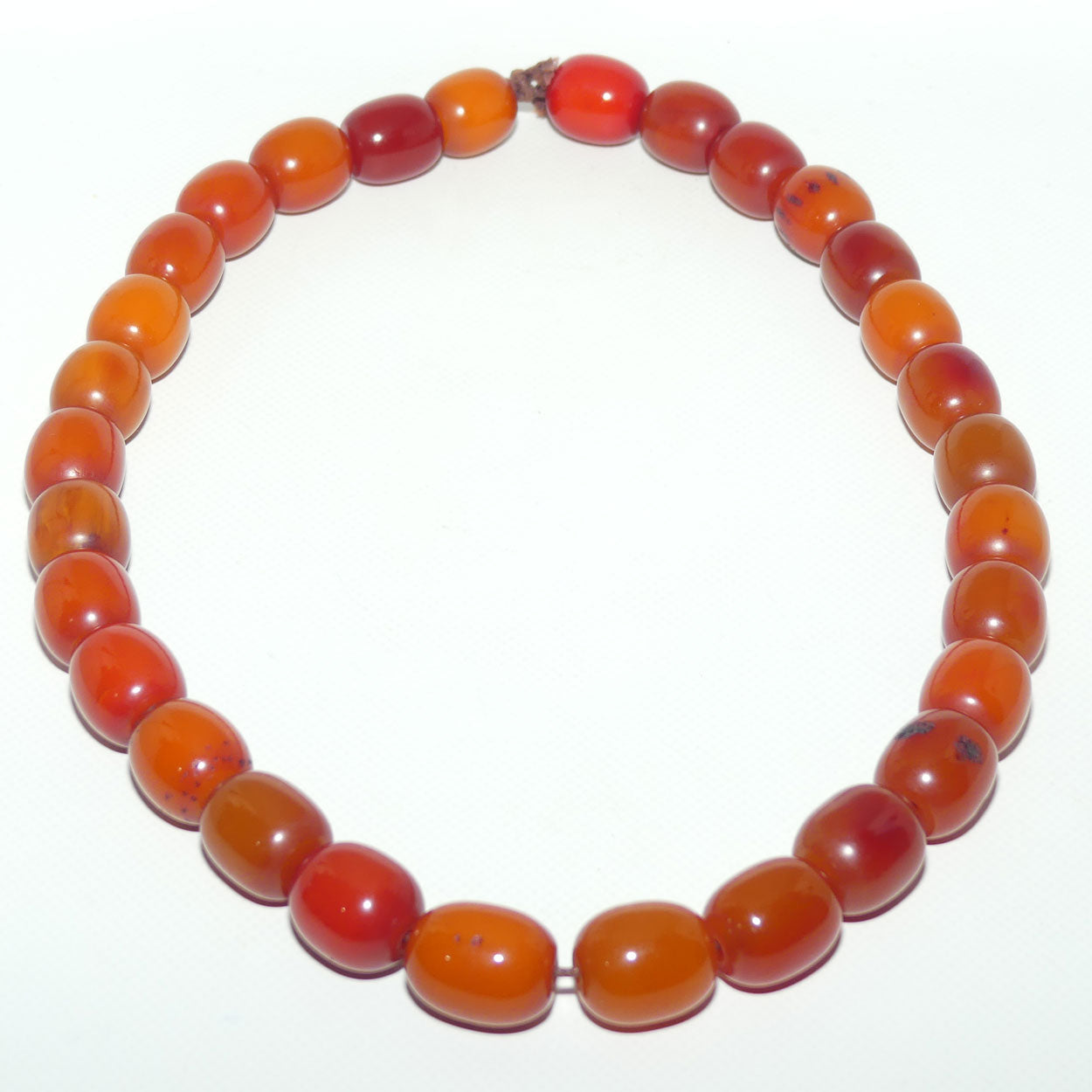 Very Heavy Antique set of Butterscotch Amber beads - strung on cord | 70cm total length