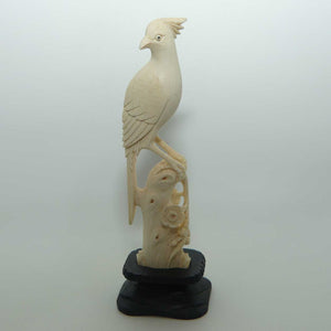 Carved Ivory Cardinal in wooden stand