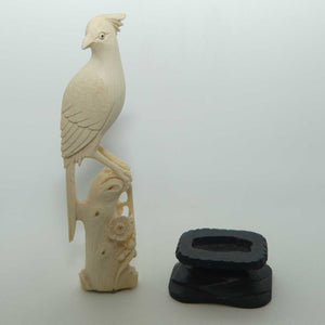 Carved Ivory Cardinal in wooden stand