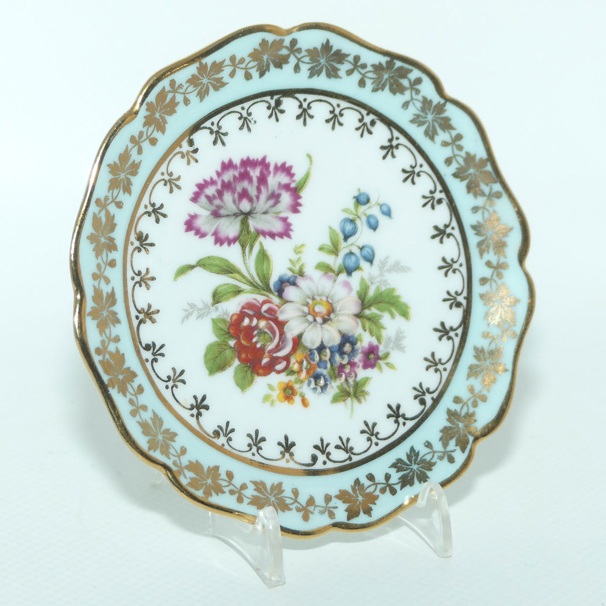 Rehausse Main Limoges France Pale Blue and Gilt border Carnation scene plate | 9cm wide