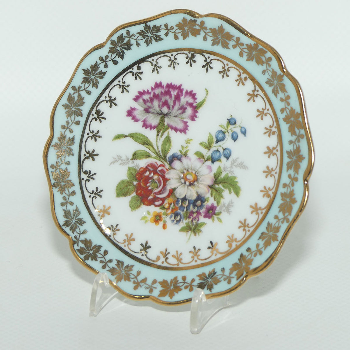 Rehausse Main Limoges France Pale Blue and Gilt border Carnation scene plate | 9cm wide