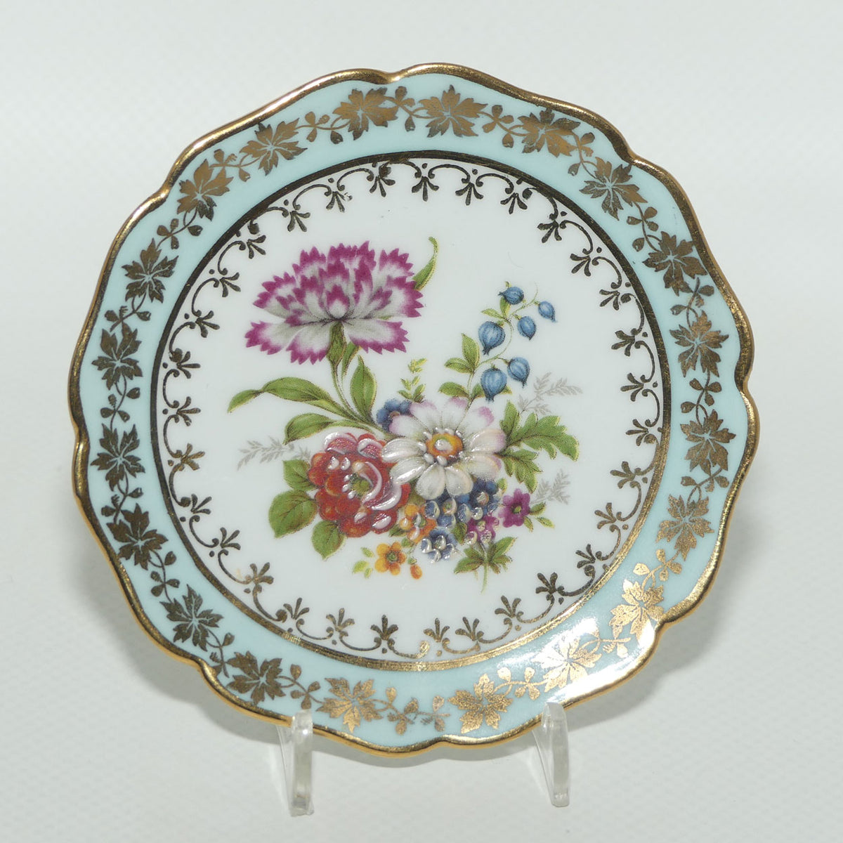 Rehausse Main Limoges France Pale Blue and Gilt border Carnation scene plate | 9cm wide