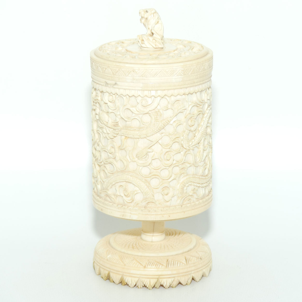 Elaborately carved Ivory lidded pot | Lion finial | Continuous Dragon
