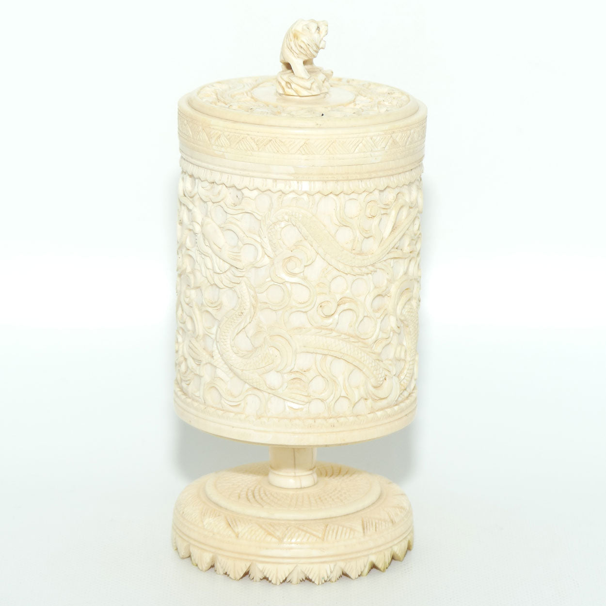 Elaborately carved Ivory lidded pot | Lion finial | Continuous Dragon