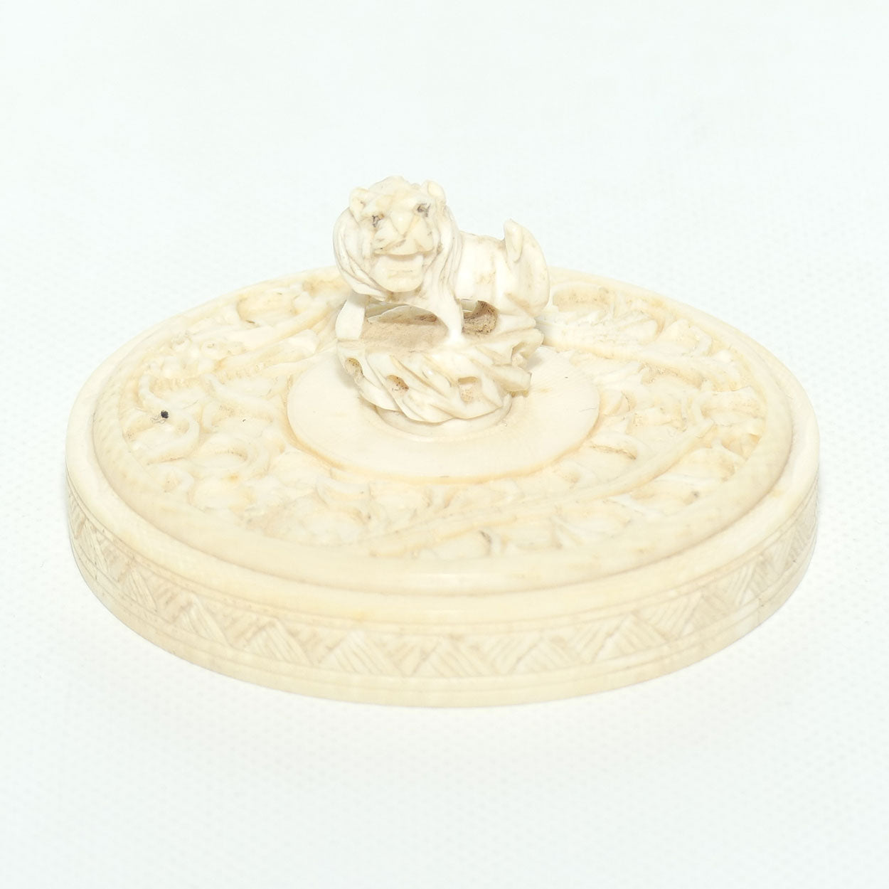 Elaborately carved Ivory lidded pot | Lion finial | Continuous Dragon
