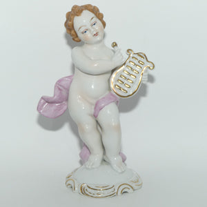 Neutettau Porcelain Bavaria | Pair of Putti figures | One with Drums | One with Harp