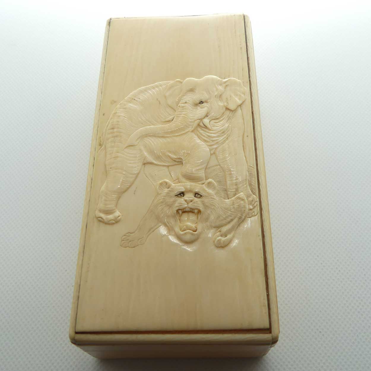 Carved Ivory trinket box depicting Elephant and Tiger