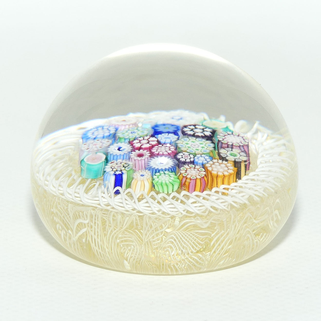 John Deacons Scotland Closepack Millefiori Torsade on Cream Medium paperweight