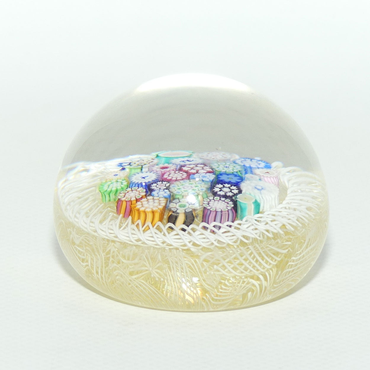 John Deacons Scotland Closepack Millefiori Torsade on Cream Medium paperweight