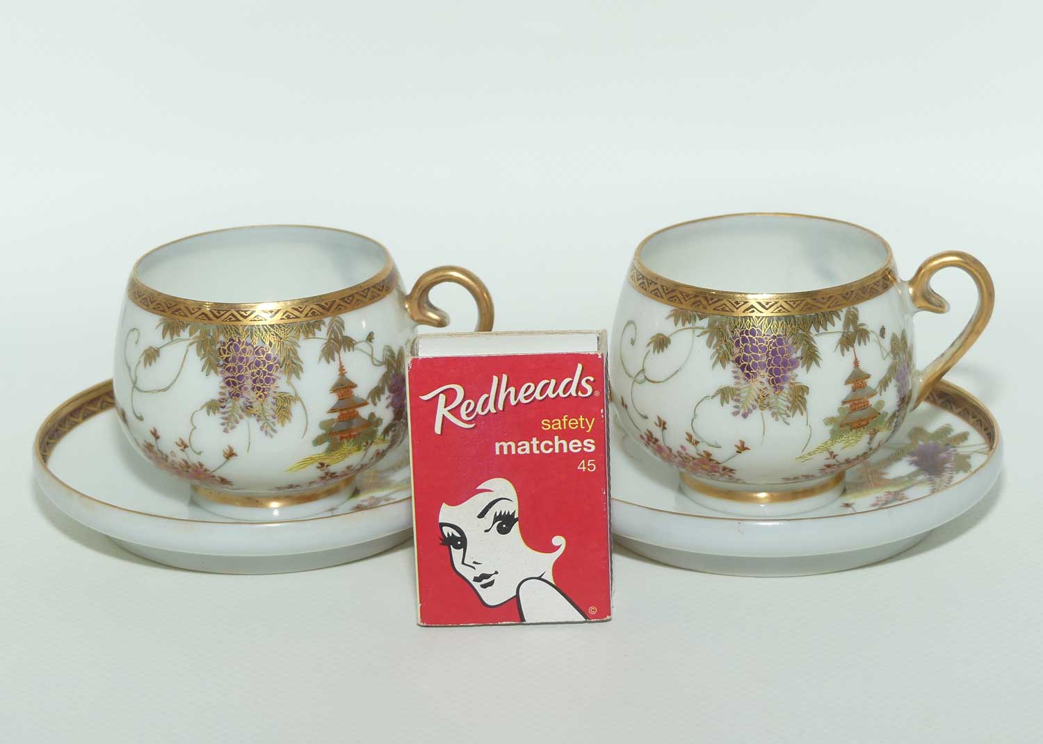 Japanese Eggshell China pair of duos decorated with Pagoda and Wisteria