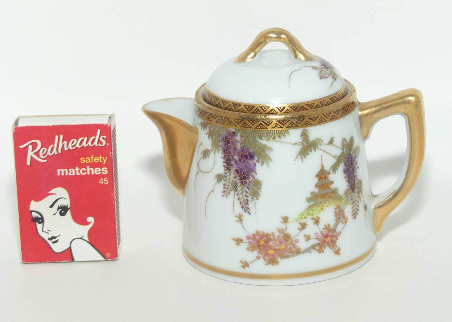 Japanese Eggshell China milk jug decorated with Pagoda and Wisteria