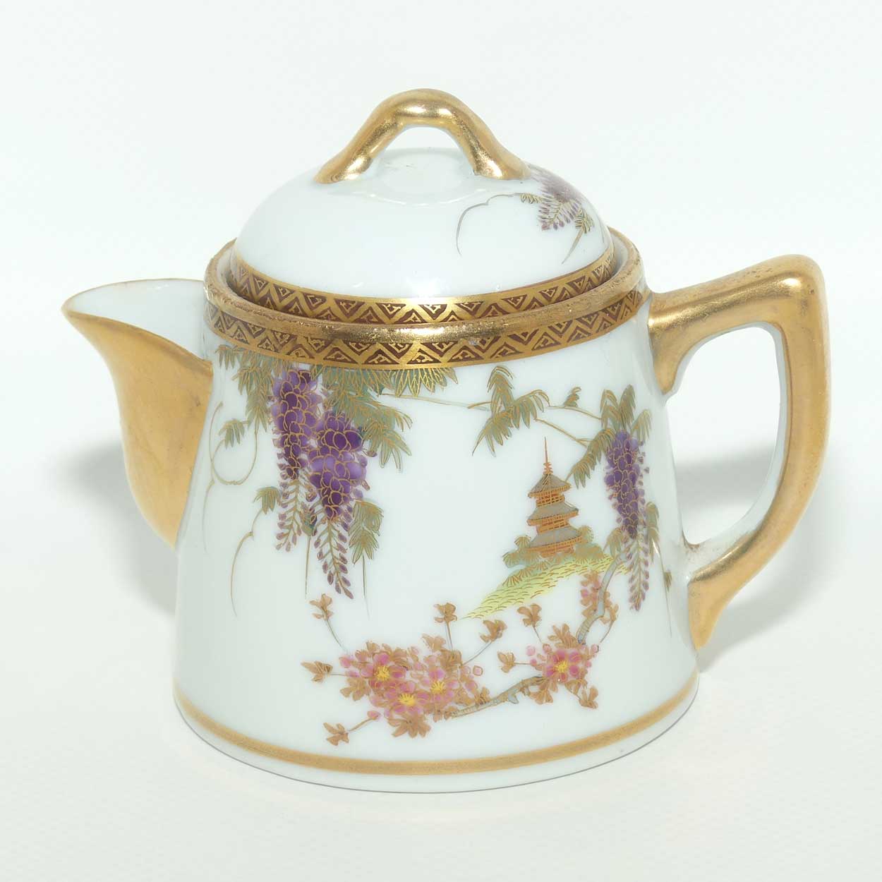Japanese Eggshell China milk jug decorated with Pagoda and Wisteria
