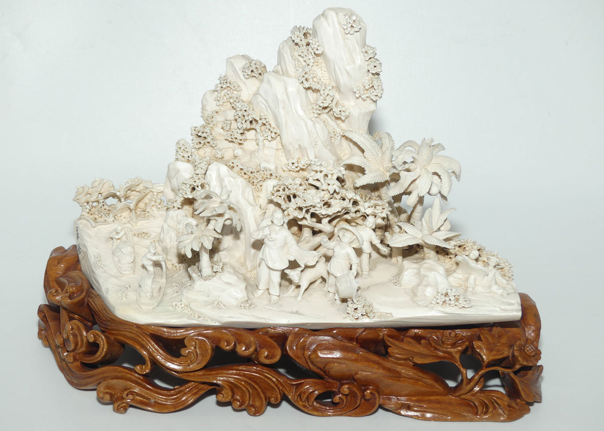 Magnificent Chinese Carved Ivory complex figure of Fishing Village on ornate wooden display stand