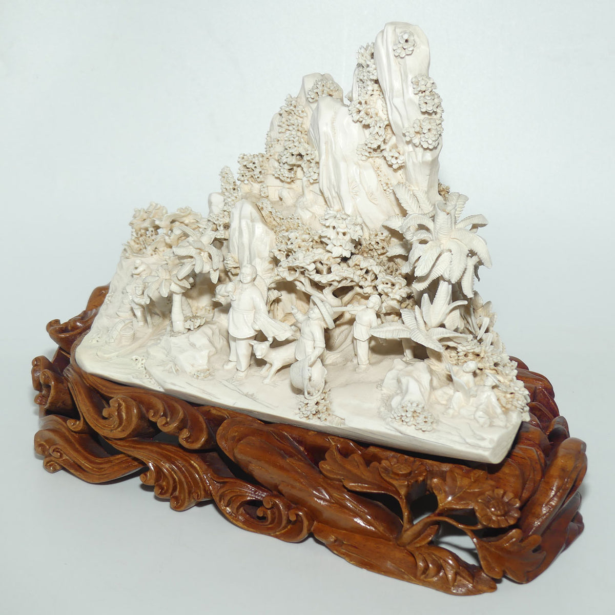 Magnificent Chinese Carved Ivory complex figure of Fishing Village on ornate wooden display stand