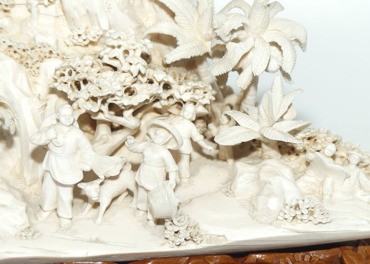 Magnificent Chinese Carved Ivory complex figure of Fishing Village on ornate wooden display stand