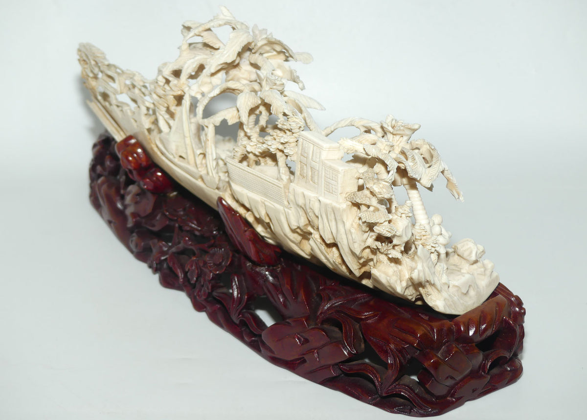 Magnificent Chinese Carved Ivory complex figure of Fishing Village on ornate wooden display stand | 42cm long