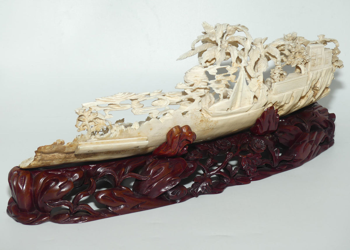 Magnificent Chinese Carved Ivory complex figure of Fishing Village on ornate wooden display stand | 42cm long