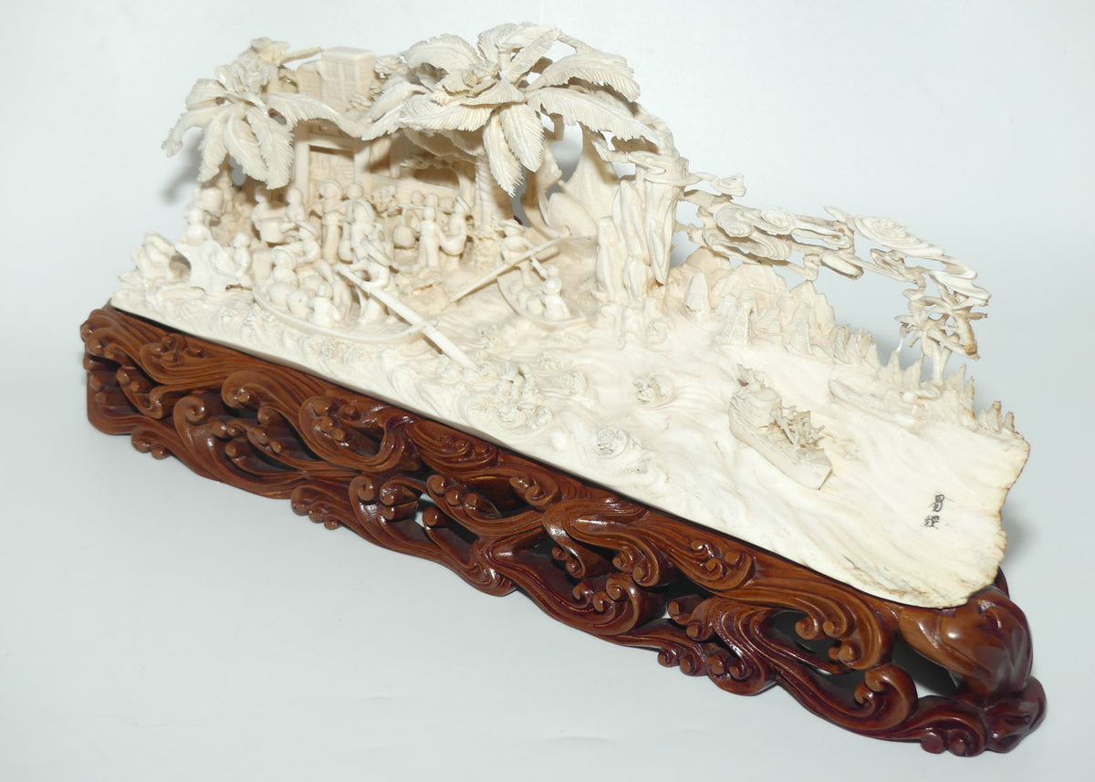 Magnificent Chinese Carved Ivory complex figure of Fishing Village on ornate wooden display stand | 42cm long