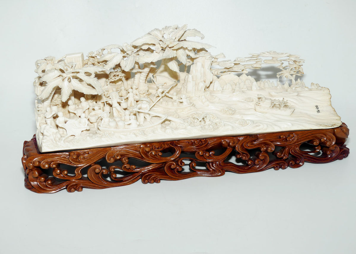 Magnificent Chinese Carved Ivory complex figure of Fishing Village on ornate wooden display stand | 42cm long