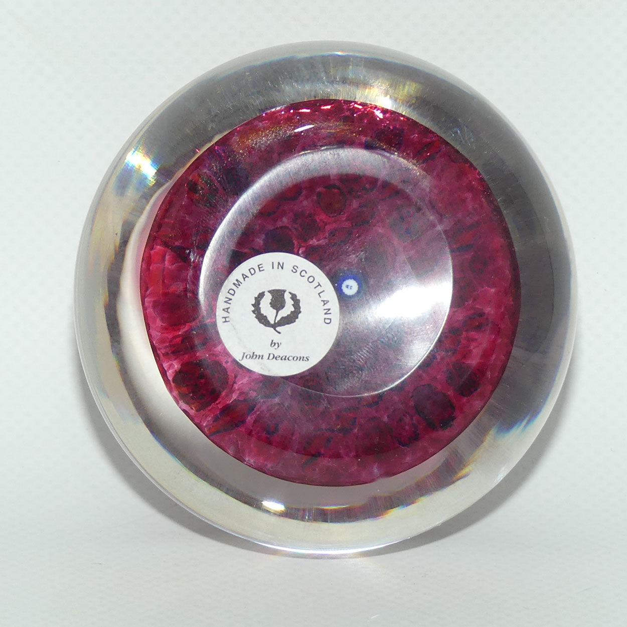 John Deacons Scotland Complex Linear Magnum Cranberry paperweight