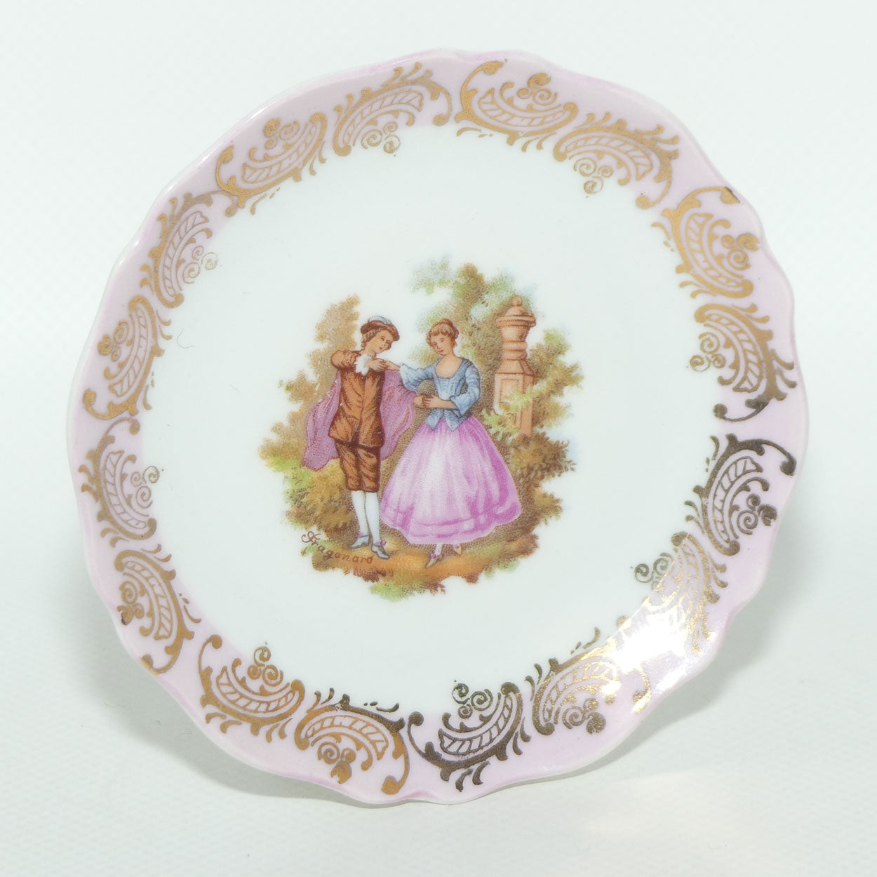 Limoges France Pink and Gilt border Courting Scene plate | 9.7cm wide