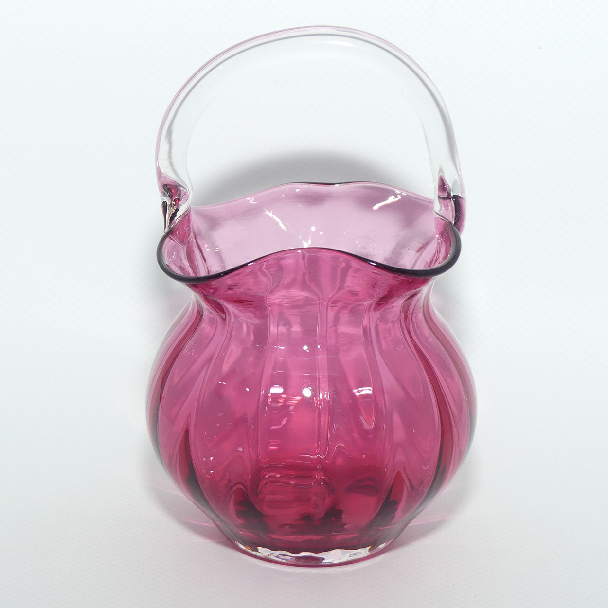 Small Cranberry Glass basket with clear glass handle