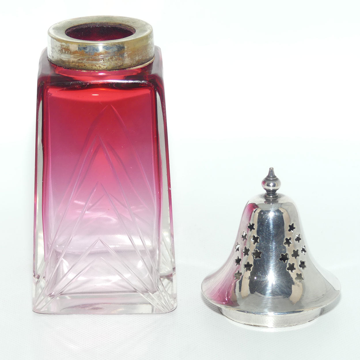 Victorian era Cranberry Glass with facetted design sugar castor | EPNS lid