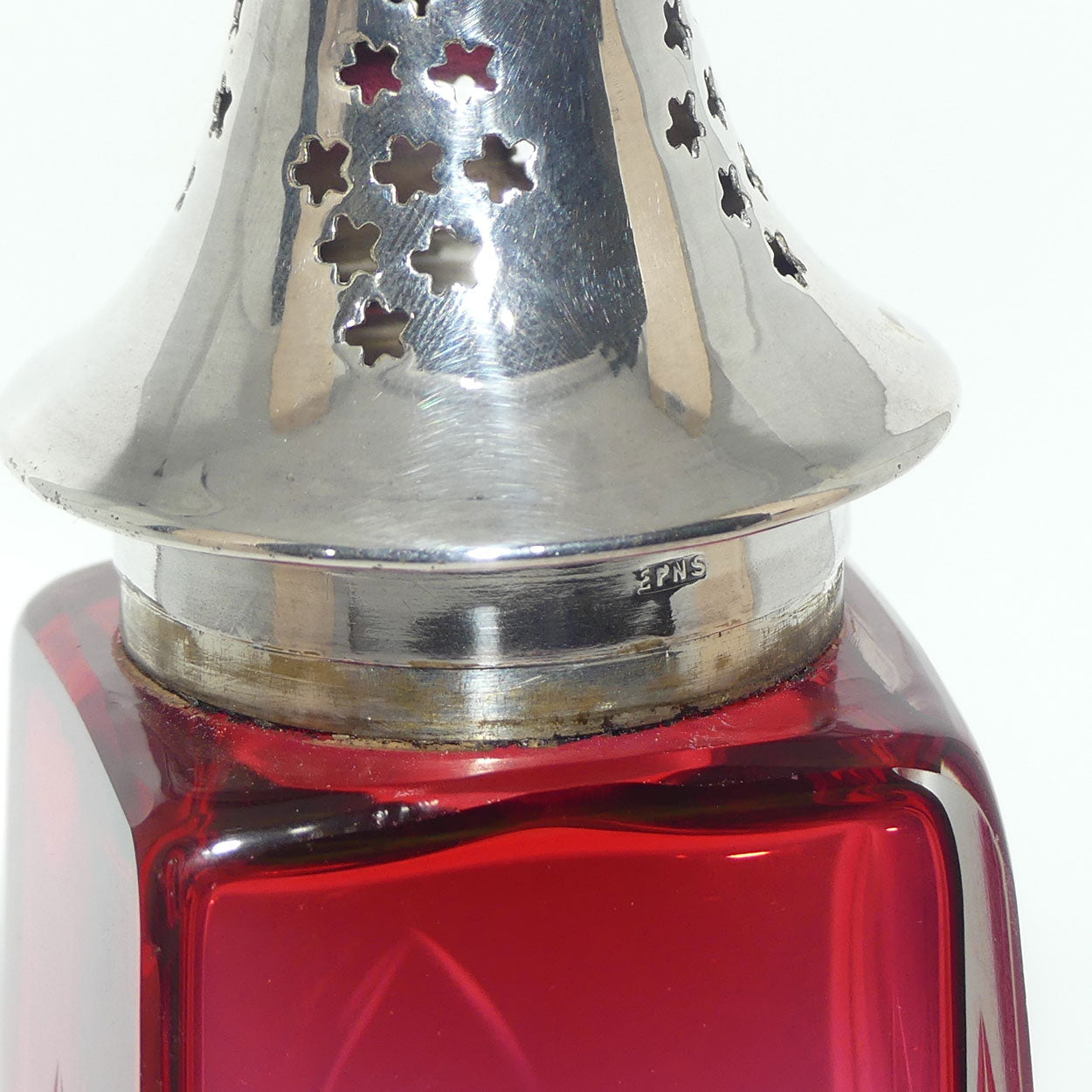 Victorian era Cranberry Glass with facetted design sugar castor | EPNS lid